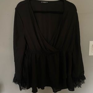 Sheer black blouse
